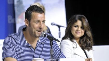 Adam Sandler, left, and Selena Gomez answer questions about "Hotel Transylvania" at the Toronto International Film Festival.