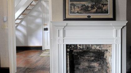 The living room fireplace and mantel at Church  Street in Ambridge.