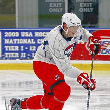 Jared Staal takes the puck down the ice in the opening hockey practice of the Charlotte Checkers training camp in Indian Trail, N.C. Several of the Carolina Hurricanes players are training with the Checkers, their AHL affiliate team, during the NHL lockout.