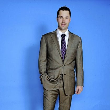The Pirates' Neil Walker models a suit from Astor & Black.