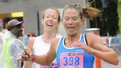 Sara Raschiatore of Pittsburgh edges Roberta Groner of Irwin at the tape to win the 10k women''s division at the 35th Great Race in Point State Park on Sunday. Both recorded at time of 34 minutes, 46 seconds.