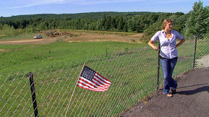 Laura Beachy stands near the crash site in Somerset County.
