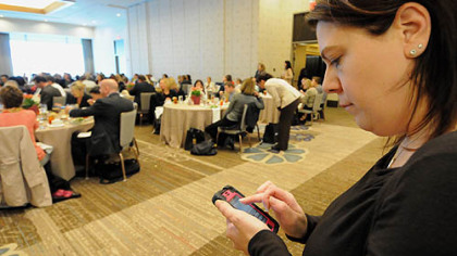 Amie Downs, Allegheny County Executive Rich Fitzgerald's communications director, tweets from  a real estate talk  at the Fairmont Pittsburgh hotel.