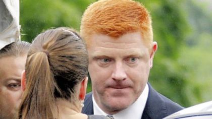 Penn State University assistant football coach Mike McQueary arrives at the Centre County Courthouse to testify in the child sexual abuse trial of former Penn State University assistant football coach Jerry Sandusky in Bellefonte, Pa., Tuesday, June 12, 2012.