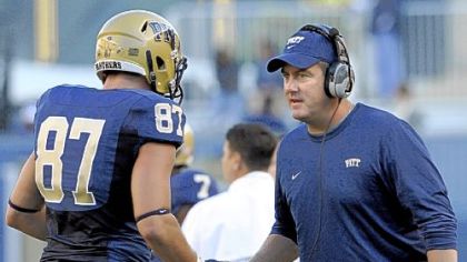 Pitt head coach Paul Chryst congratulates Mike Shanahan after scoring a touchdown against Gardner-Webb Sept. 22 at Heinz Field.