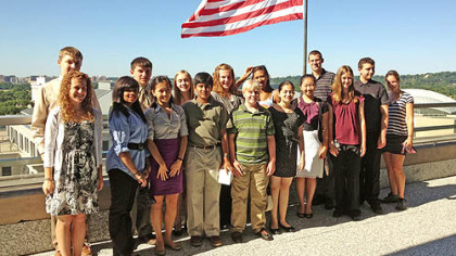 2012 Student Ambassadors pose on the private balcony of the State Department Building in Washington D.C. The students in the "I want to be an ambassador!" program were given a private tour of the historic Diplomatic Reception Rooms in June.