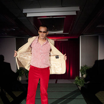 A model for C. Brown Custom Clothiers designed by Carly Brown and Corey Brown walks the runway during back-to-back fashion shows at the Clarion Hotel & Convention Center in Green Tree.
