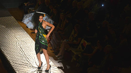 A model, in a look from Lana Neumeyer, walks the runway during the kickoff event of Pittsburgh Fashion Week at Soldiers & Sailors Memorial Hall and Museum, Oakland.