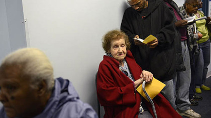 Sophie Masloff, 94, of Squirrel Hill, a former mayor of Pittsburgh, waits in line with others for voter identification Monday evening at the CCAC Homewood-Brushton Center. A judge ruled this morning to toss out a portion of the law.