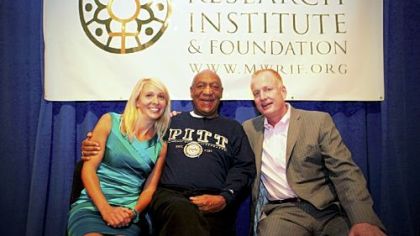 Bill Cosby with Julie and Mike McMullen.