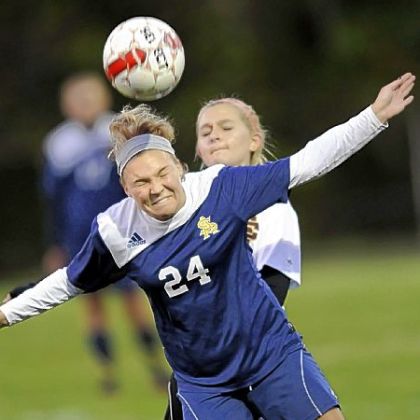 South Allegheny's Alyssa Ashcroft heads a pass to a teammate against Serra.