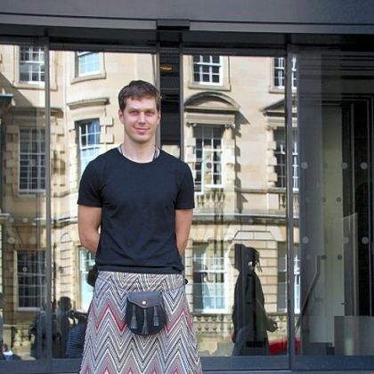 Balazs Kiss, in a Missoni print kilt outside of the Missoni Hotel in the Old City of Edinburgh.