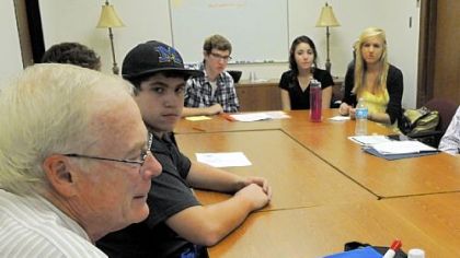 A 1962 graduate, Stewart Early, now living in Bethlehem, Pa., talks to current students. He works as a management consultant and engineer.
