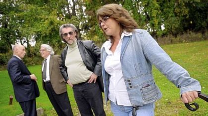 Teresa Pefferman, union Unit Secretary for Vincentian Regency Nursing Home and Charles Leonard, staff representative for the USW, who represents employees, wait outside a meeting to discuss contract issues with concerned employees and family members.