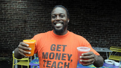 Knowledge Huson of Juice Up 412 shows off the product during the first "Good Truck Friday" in the Strip District.