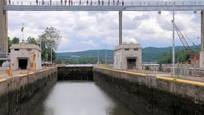 Overlooking the landside lock, U.S. Army Corps of Engineers and barge industry executives walk atop the Charleroi Lock and Dam during a tour of the Locks and Dams 2, 3, and 4 of the lower Monongahela River.