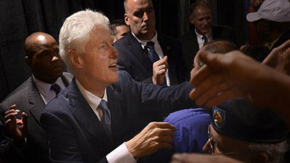 Former President Bill Clinton stumps for U.S. Rep. Mark Critz at a rally Thursday at the International Brotherhood of Electrical Workers Local 712 union hall in Beaver.