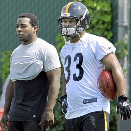 The pressure is on Isaac Redman, right, and Rashard Mendenhall to help the Steelers develop a balanced offense -- something they haven't had this season.