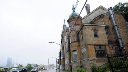 Route 28 traffic moves past St. Nicholas Church.