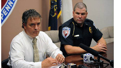 Washington, Pa., Police Lt. Dan Stanek, left, and Police Chief Robert Lemons, right, talk to the media.