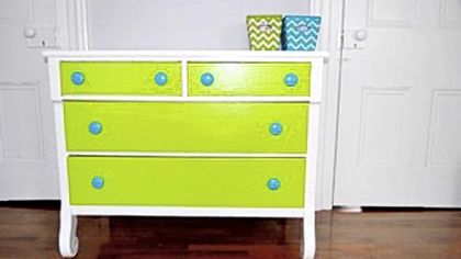 Hand-painted dresser by Melissa and Pamela Brusoski sports a crisp, white body and top, lime green drawer fronts and turquoise drawer pulls.