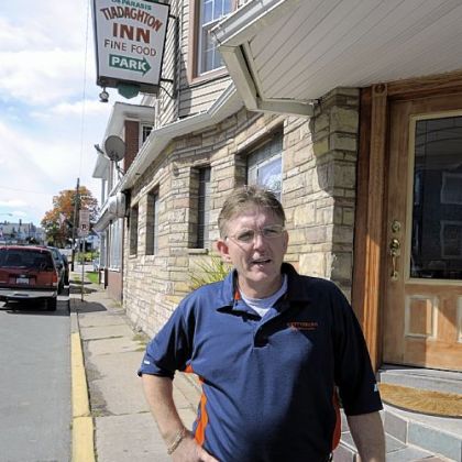 Proprietor of the Tiadaghton Inn, Sam Deparasis outside his establishment in the town of Jersey Shore, Pa.