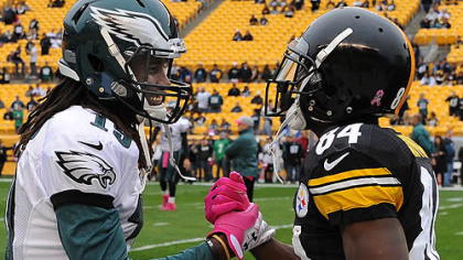 The Eagles' Mardy Gilyard greets the Steelers' Antonio Brown prior to the game.