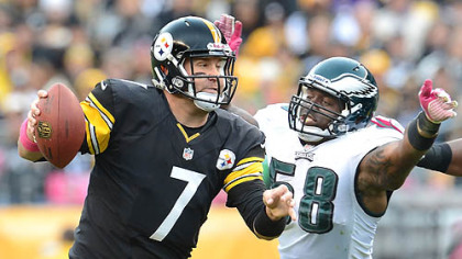 The Eagles' defensive end Trent Cole pressures Steelers quarterback Ben Roethlisberger.