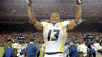 West Virginia running back Andrew Buie reacts after scoring in the fourth quarter against Texas on Saturday in Austin.