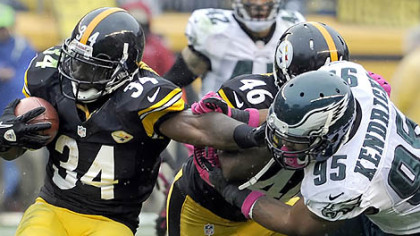Rashard Mendenhall pushes away from the Eagles' Mychal Kendricks in the third quarter Sunday at Heinz Field.