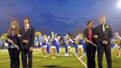 Homecoming nominees stand on the field before the home game at West Mifflin against Elizabeth Forward.