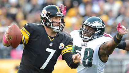 The Eagles' defensive end Trent Cole pressures Steelers quarterback Ben Roethlisberger.