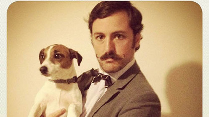 Adam Causgrove, 28, of Mount Washington, with Oliver, is a finalist for the Robert Goulet Memorial Mustached American of the Year award.