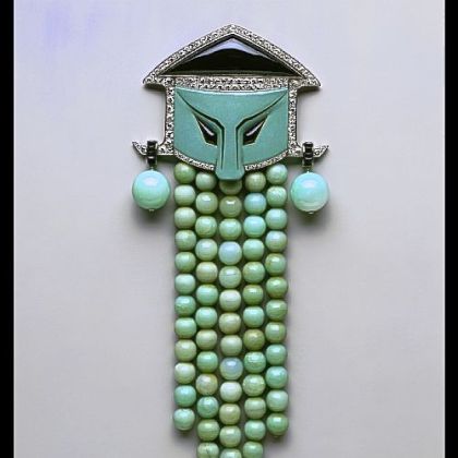 Corsage ornament of jade, onyx, diamonds, enamel and platinum was made by Georges Fouquet and exhibited at a 1925 Paris exposition.