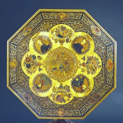 Peter Glass, a German cabinetmaker who immigrated to the U.S., made this mosaic walnut table inlaid with various woods. Shown at the Paris exposition in 1867, it contains flowers, insects, birds, portraits of U.S. presidents and military leaders.