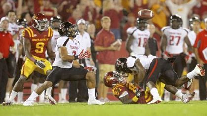 Texas Tech safety D.J. Johnson, right, breaks up a pass intended for Iowa State's Ernst Brun Jr., allowing teammate Cornelius Douglas, left, to move in for the interception in a game earlier this season. Texas Tech is No. 1 in NCAA Division I-A in pass defense and No. 2 overall.