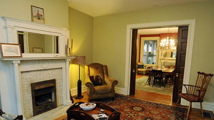 Pocket doors separate the living room from the dining room in Ty and Sue Ely's home in Shadyside.