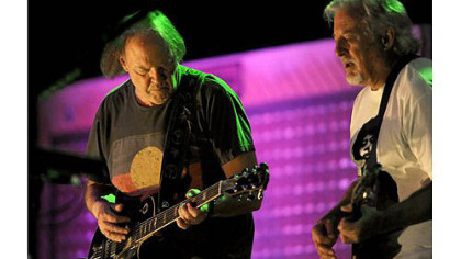 Neil Young performs with Crazy Horse at the Petersen Events Center Tuesday night.