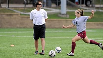 Yon Struble conducts practice Friday afternoon for his Carnegie-Mellon team. As coach of the U.S. Women's Deaf National Soccer team, he led his athletes to a gold medal in Ankara, Turkey, in July.