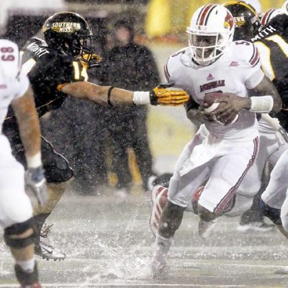 Louisville quarterback Teddy Bridgewater pulls away from Southern Miss linebacker Terrick Wright in a game No. 19 Louisville won, 21-17.