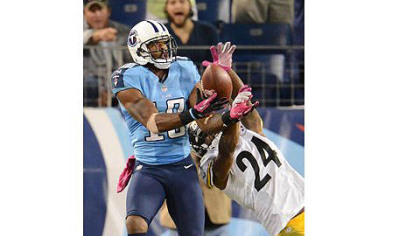 The Titans Kenny Britt makes catch in the end zone over Ike Taylor.