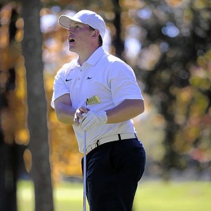 Central Catholic's Brent Rodgers follows the ball after teeing off on the 14th hole of the WPIAL golf team championship Thursday at Cedarbrook Golf Course in Rostraver.