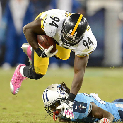 The Steelers' Lawrence Taylor intercepts a pass