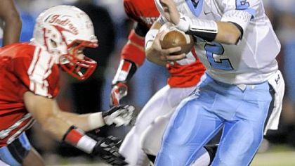 Seneca Valley quarterback Jordan Brown runs the ball in the first half Friday against North Hills in Ross Township. Seneca Valley won, 40-26.