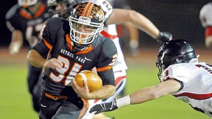 Bethel Park's Zachary Enick carries against Upper St. Clair Friday night.