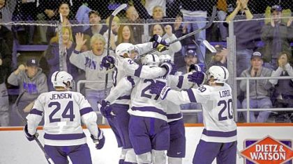 Penn State celebrates its first goal of the game against American International College during an NCAA Division I hockey game at Greenberg Ice Pavilion in State College.