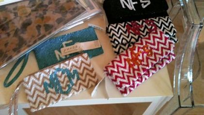 Monogrammed clutch purses in a chevron pattern, $165