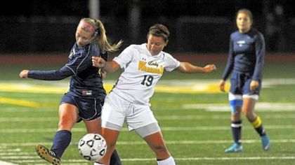 Penn-Trafford's Miranda Johnson, right, blocks Norwin's Kensey Johnson from a scoring chance.