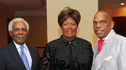 Leon Haley, Mona Generett and the Rev. Glenn Grayson