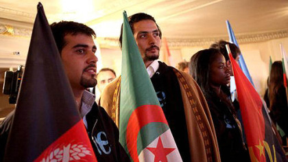 Delegates wait to be announced during the opening ceremony of the  One Young World Conference at Heinz Hall on Thursday.
